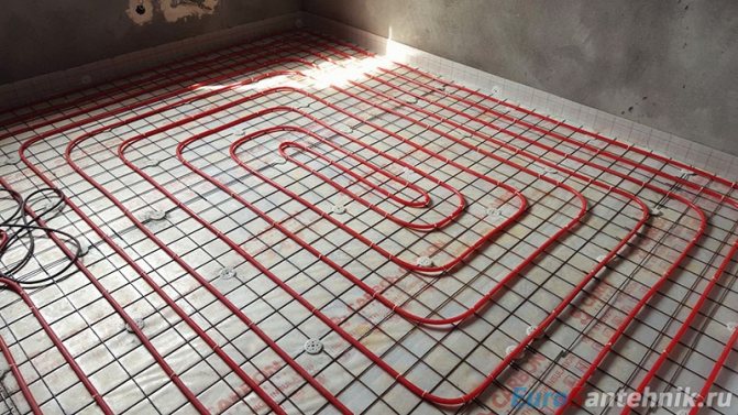 закрепване на тръбата за подово отопление към армиращата мрежа