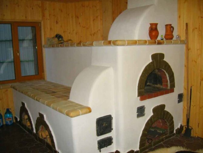 Руска печка завършена с гипс и декоративни плочки